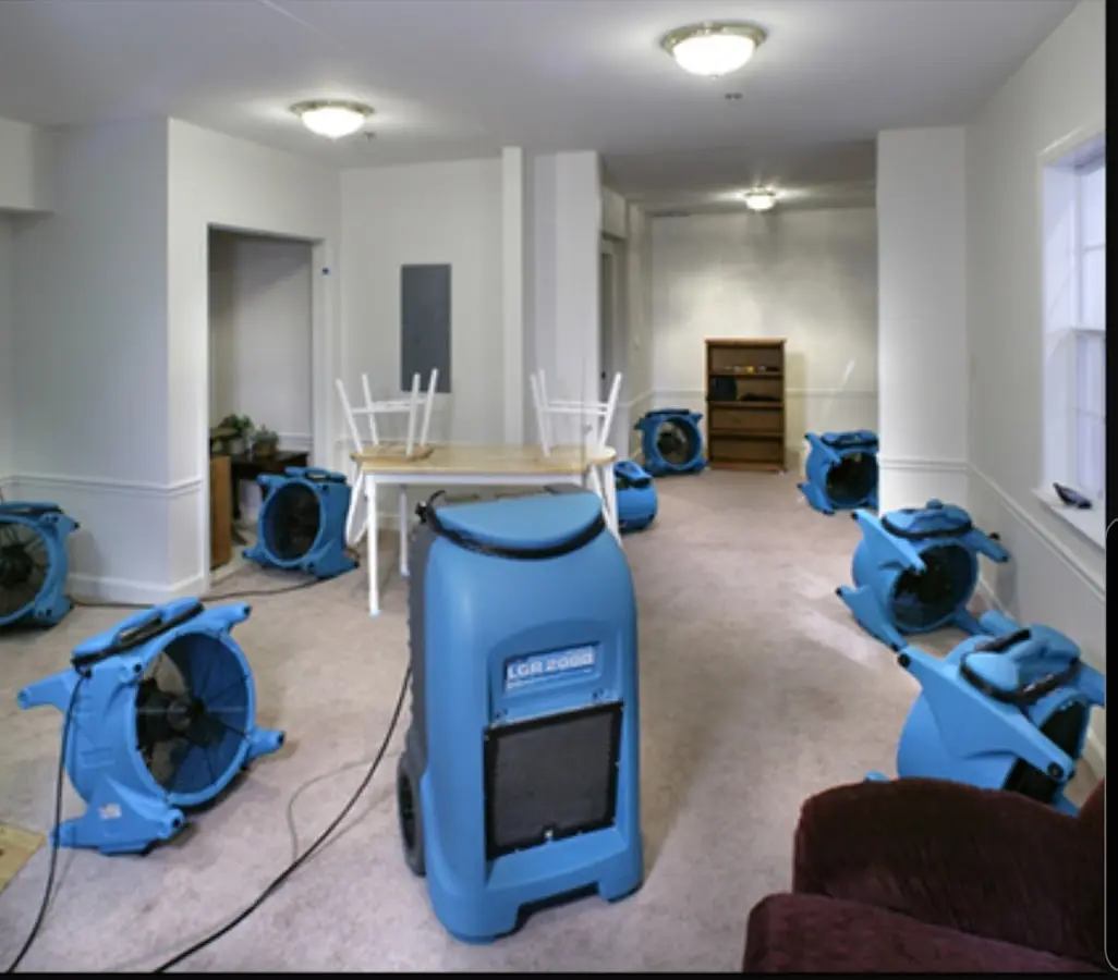 Air movers and dehumidifier setup for Water Damage Restoration in Pinewood